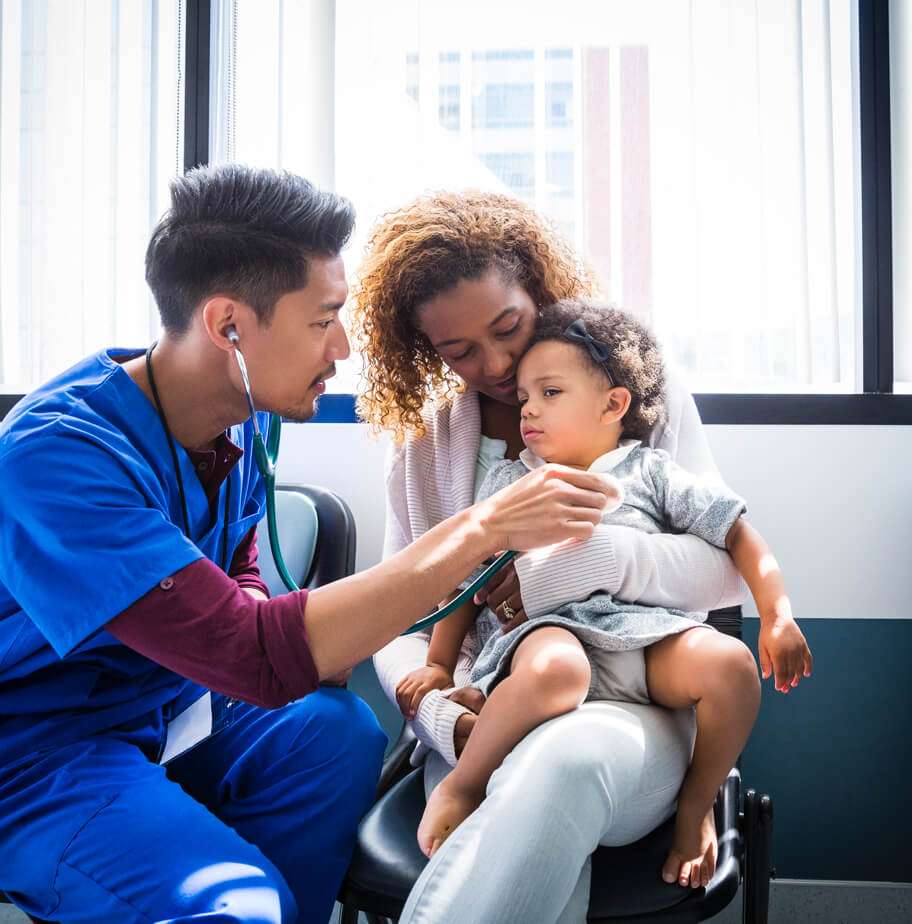 nurse examining baby